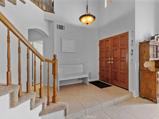 a view of an entryway with staircase