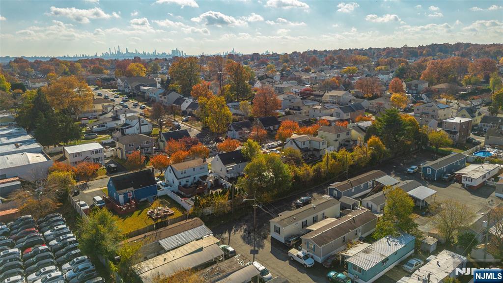 225 Albert Street Lodi, NJ 07644 - Photo 21 of 24 an aerial view of residential house with parking space