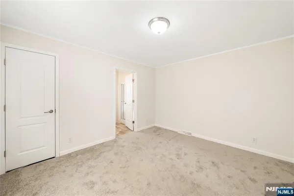 an empty room with an entryway