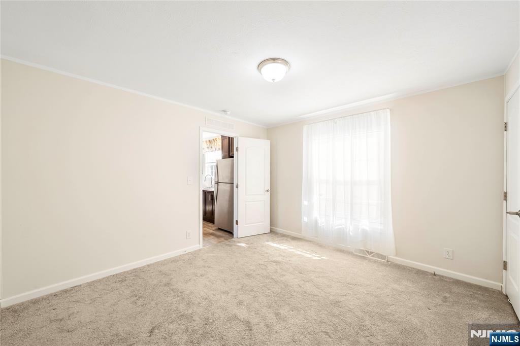 225 Albert Street Lodi, NJ 07644 - Photo 7 of 24 a view of an empty room