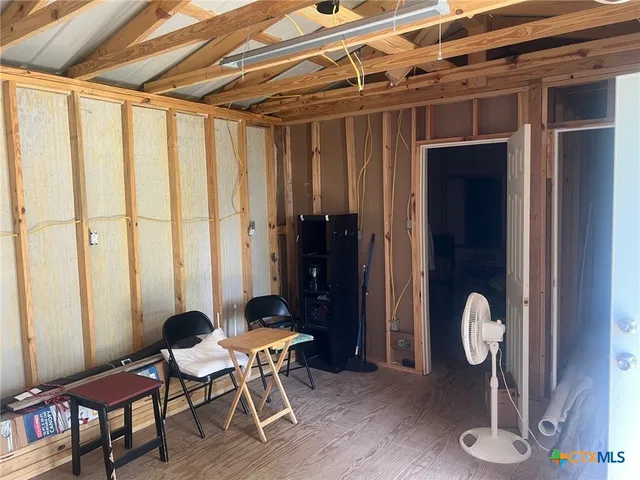 a view of a room with table and chair