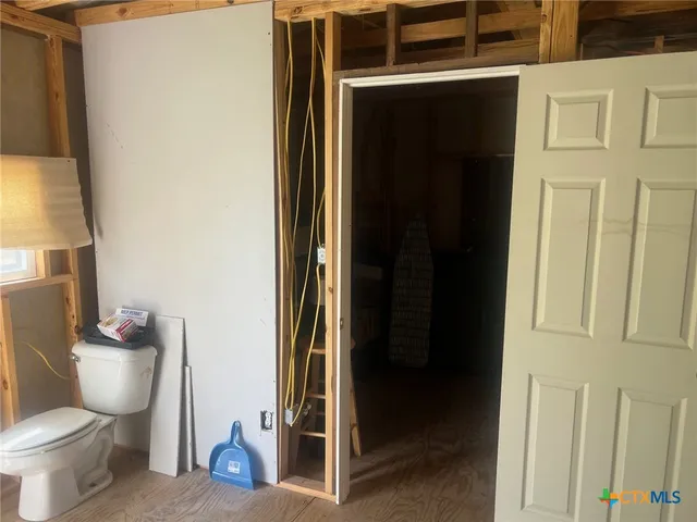 a view of bathroom with a toilet