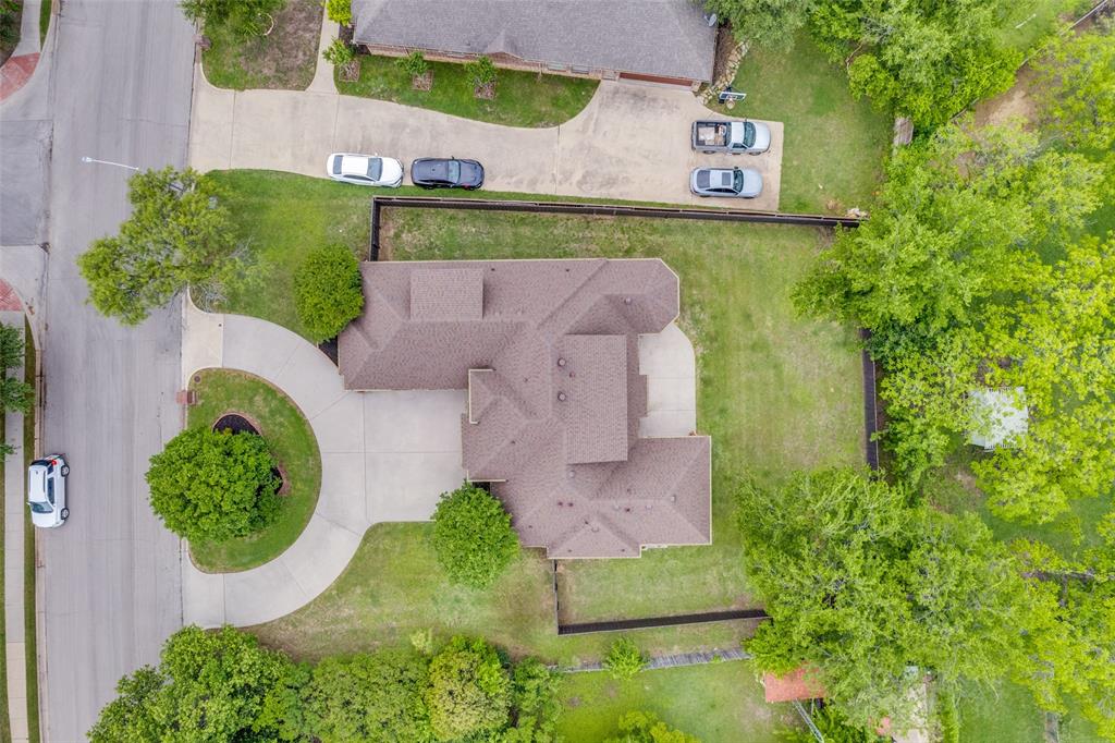 809 Longridge Drive Denton, TX 76205 - Photo 3 of 31 Property featuring a multi-gabled roofline and an expansive lot