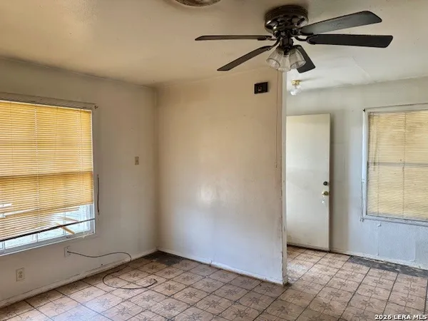 a view of an empty room and window