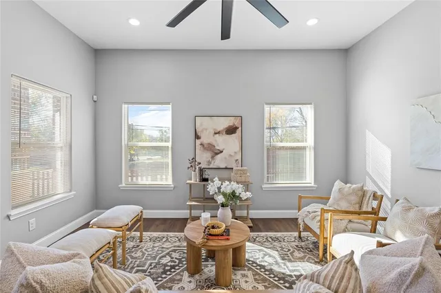 a living room with furniture and window