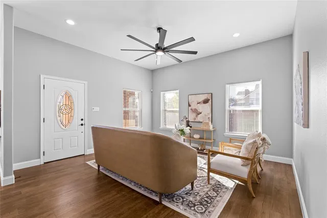 a living room with furniture and a window