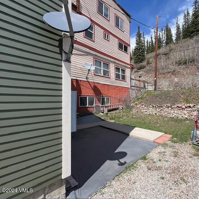 216 Eagle Street Red Cliff, CO 81649 - Photo 21 of 38 a front view of a house with garden