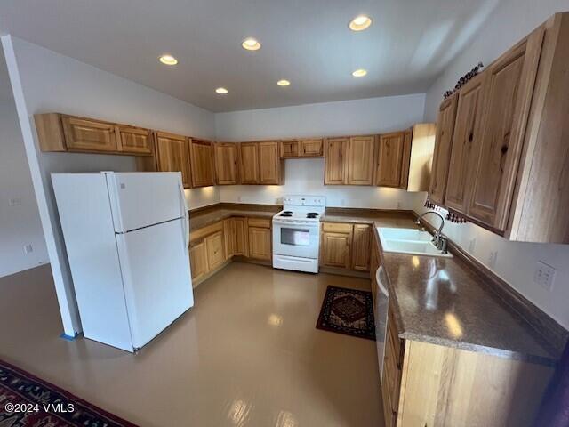 216 Eagle Street Red Cliff, CO 81649 - Photo 32 of 38 a kitchen with refrigerator and cabinets