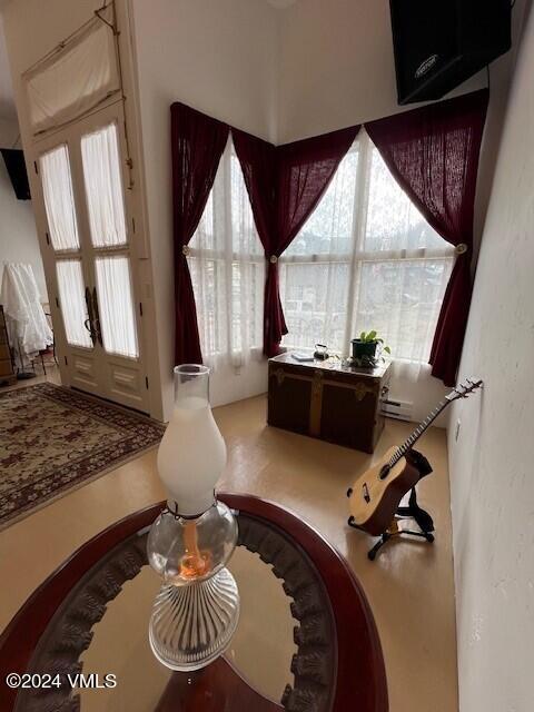 216 Eagle Street Red Cliff, CO 81649 - Photo 9 of 38 a room with gym equipment and a large window