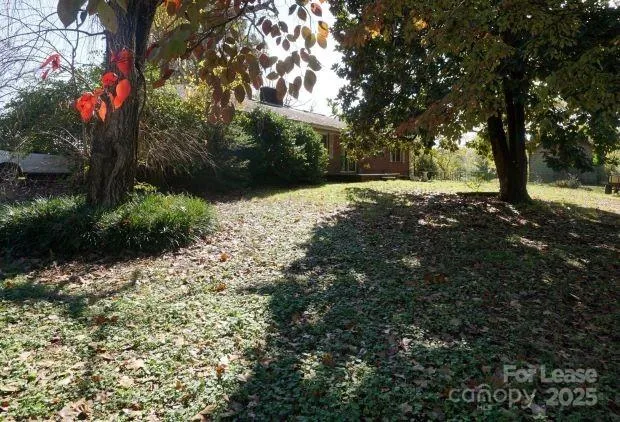 a view of outdoor space and yard