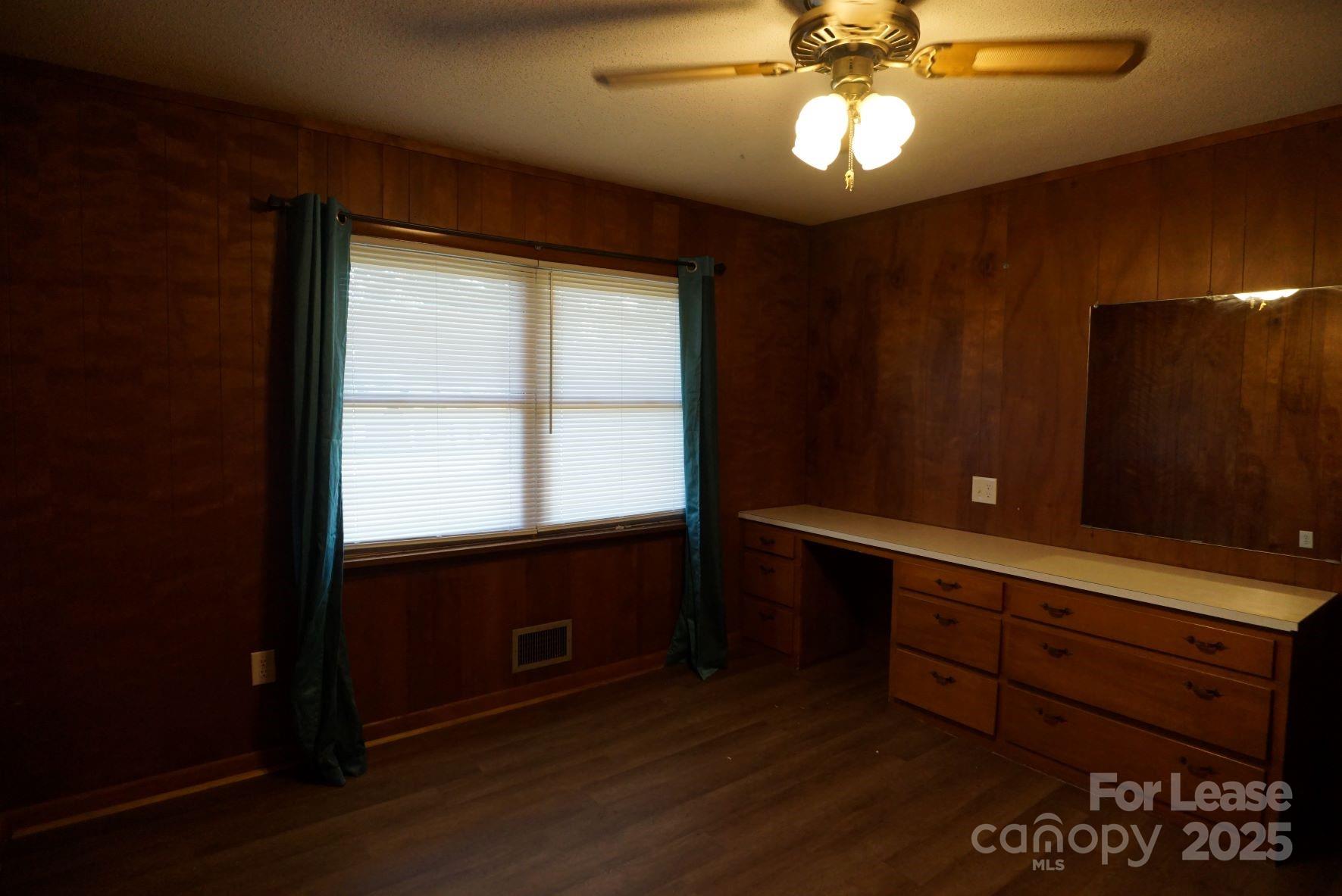 4705 Grace Chapel Road Granite Falls, NC 28630 - Photo 9 of 14 a bathroom with a sink and a large mirror