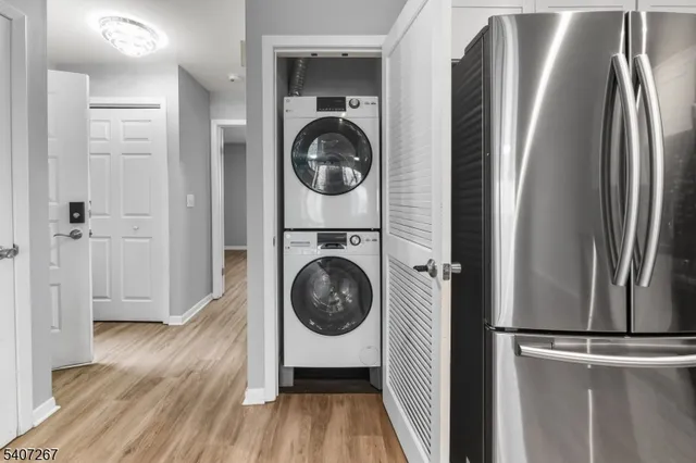 a view of a kitchen with washer and dryer
