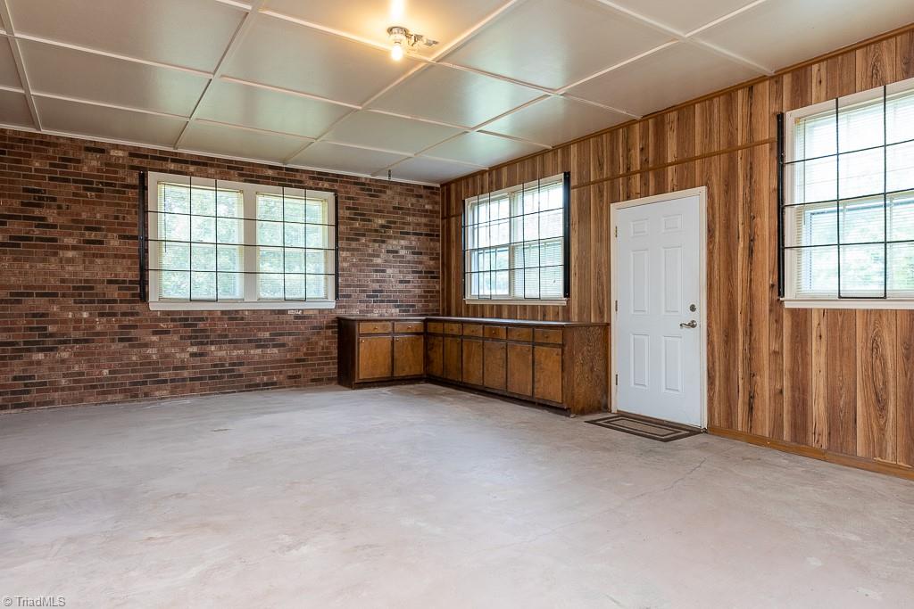 801 Taylor Road Stoneville, NC 27048 - Photo 32 of 34 Attached Large Bonus Room with custom shelving and storage