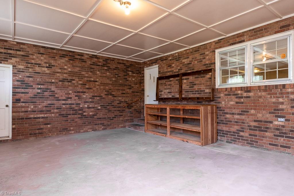 801 Taylor Road Stoneville, NC 27048 - Photo 34 of 34 Attached Large Bonus Room with custom shelving and storage