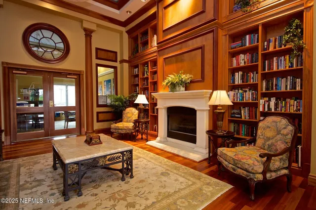 a living room with chairs