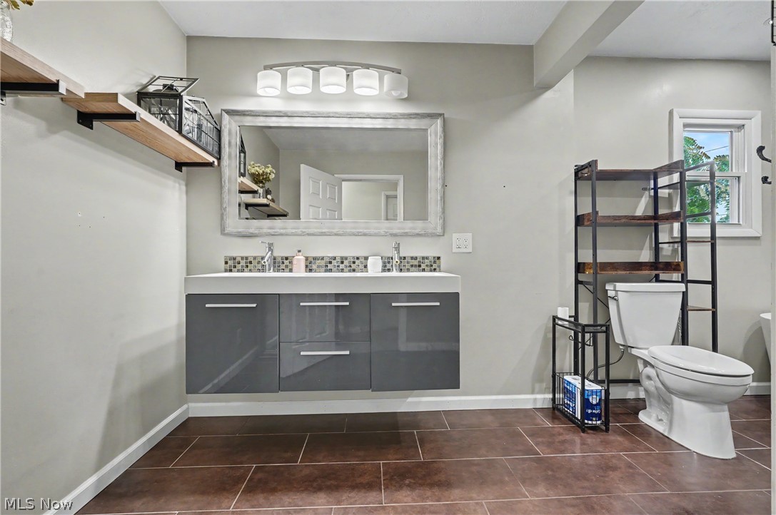 952 Ravenna Road Kent, OH 44240 - Photo 19 of 37 Spacious bathroom featuring a floating double vanity.