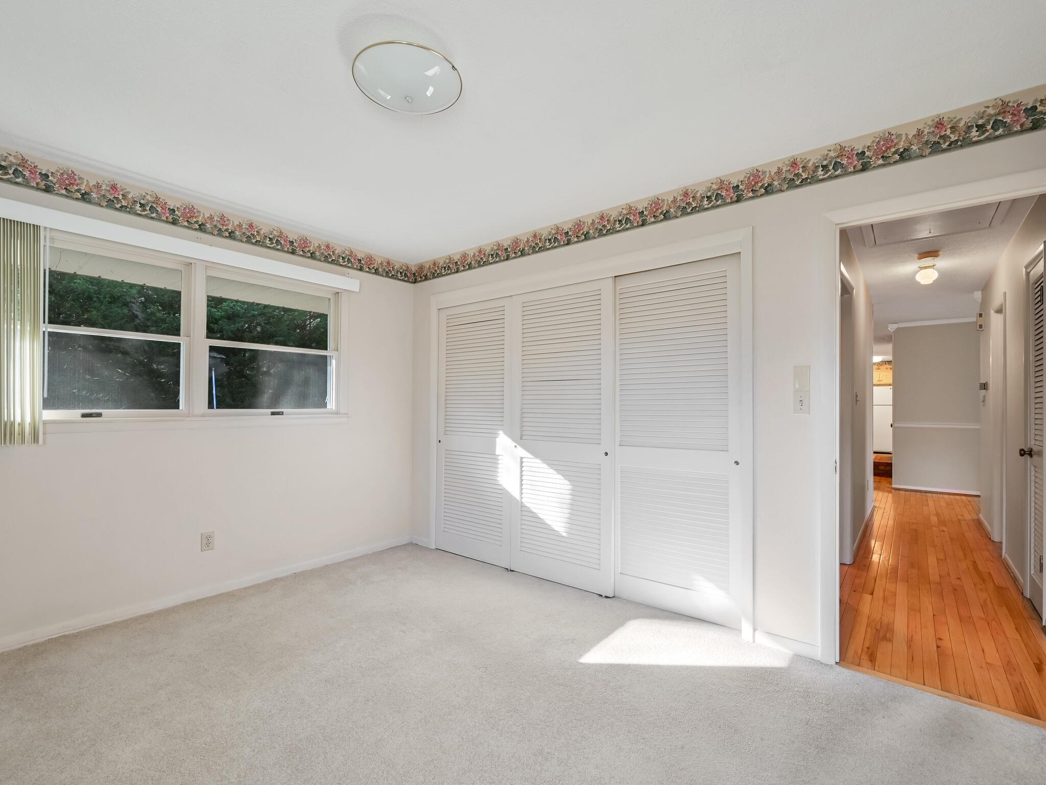 126 Apache Drive Hendersonville, NC 28739 - Photo 17 of 30 a view of an empty room with a window