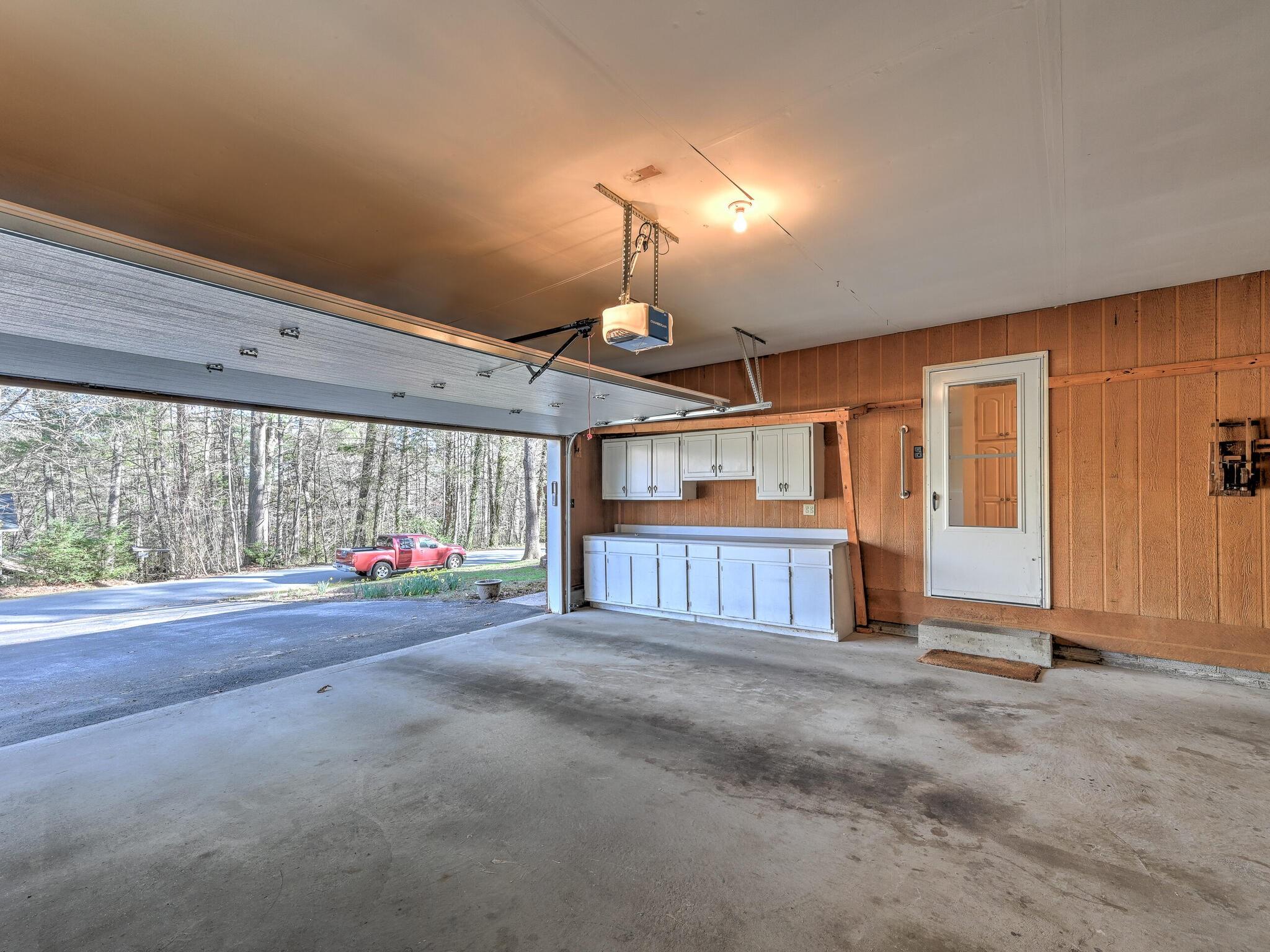 126 Apache Drive Hendersonville, NC 28739 - Photo 22 of 30 a view of empty room with a fireplace