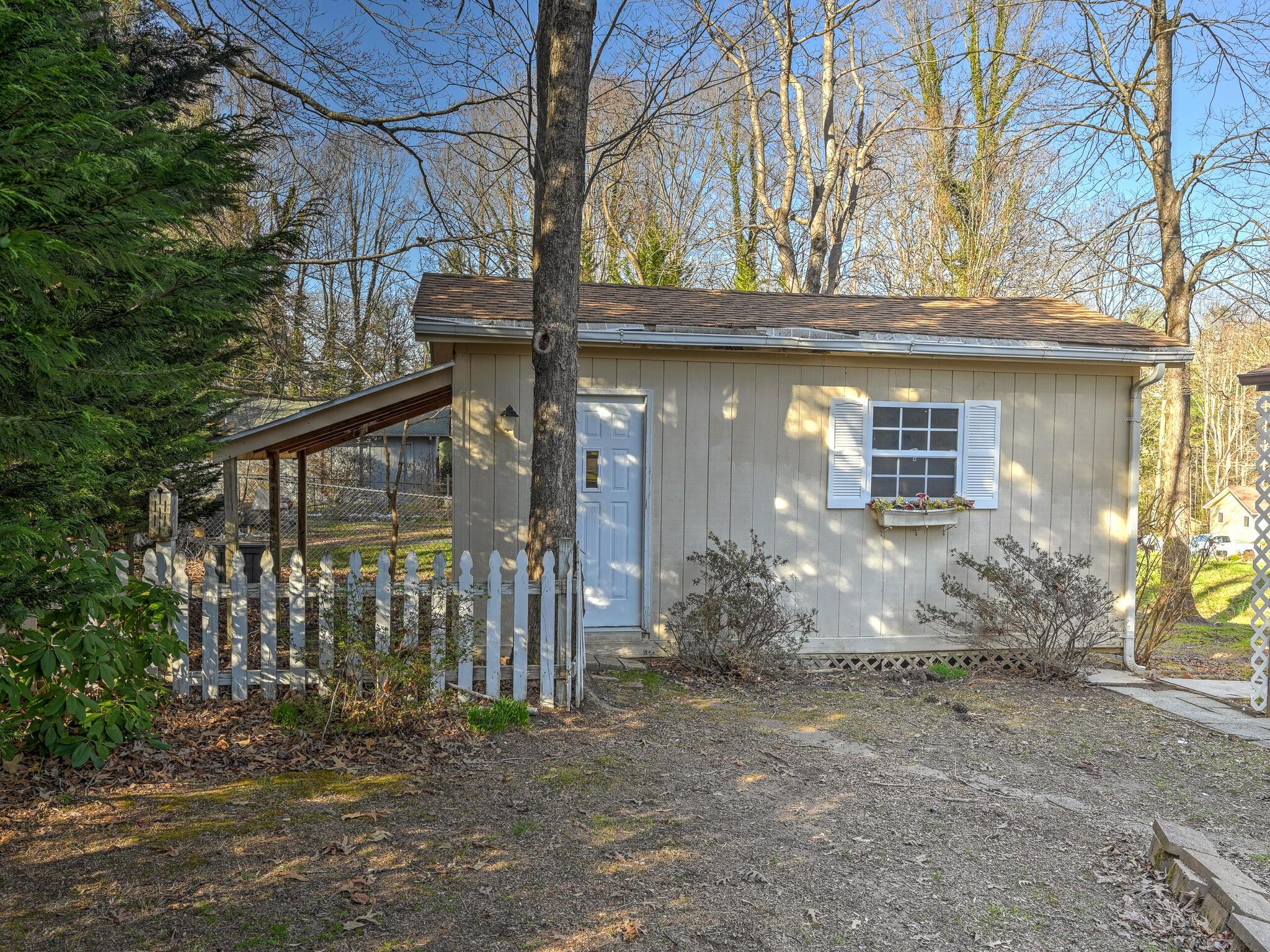 126 Apache Drive Hendersonville, NC 28739 - Photo 26 of 30 a view of a house with a tree