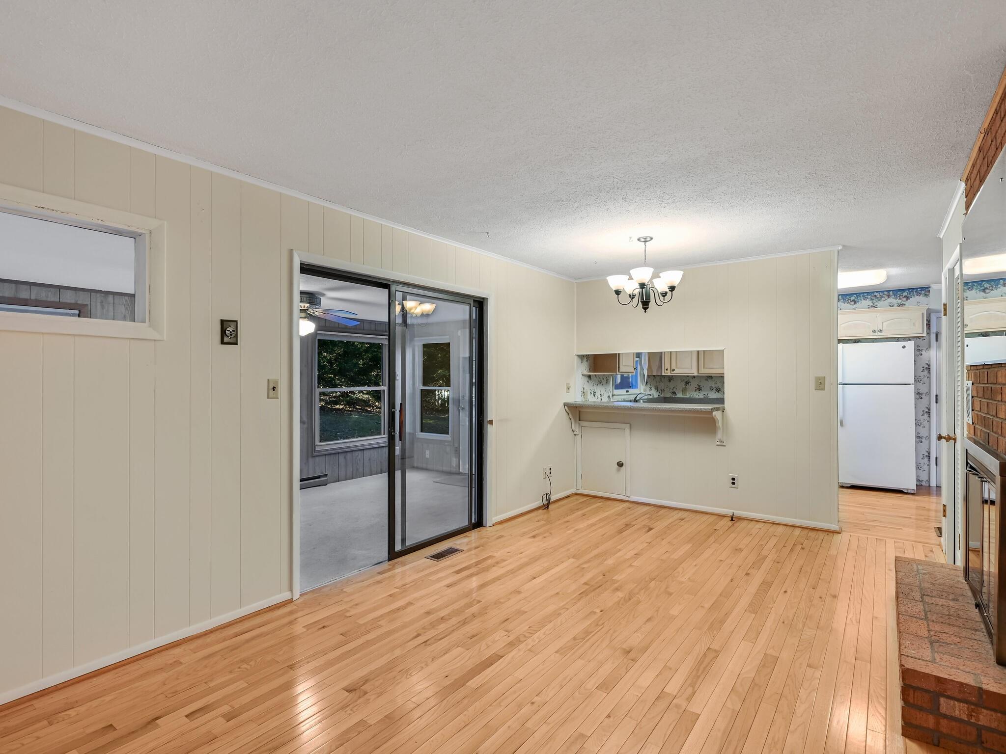 126 Apache Drive Hendersonville, NC 28739 - Photo 9 of 30 a bedroom with a bed and a window