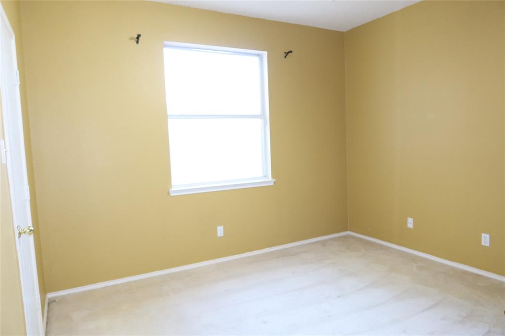 4419 Malvern Hill Road Grand Prairie, TX 75052 - Photo 14 of 24 a view of a small space with a window