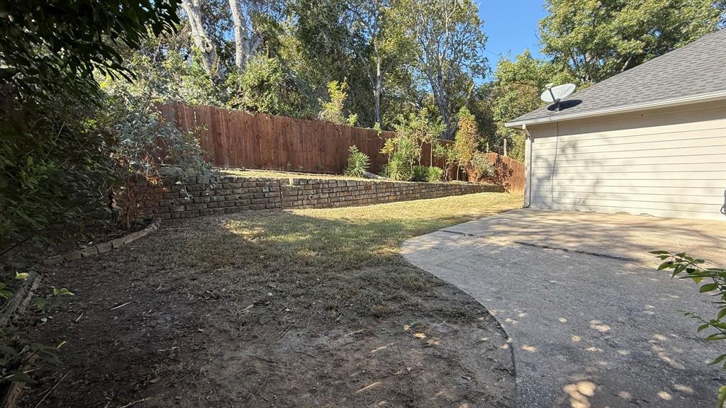 4419 Malvern Hill Road Grand Prairie, TX 75052 - Photo 23 of 24 a view of back yard of the house