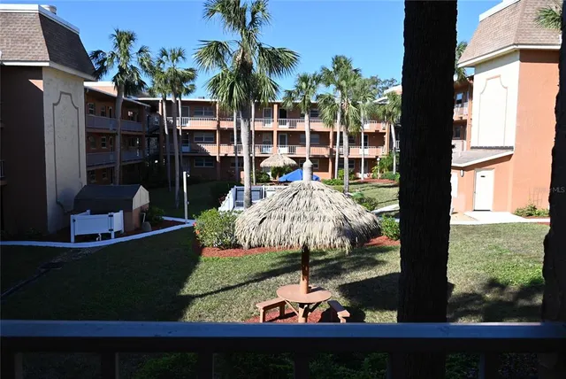 a view of swimming pool from a balcony
