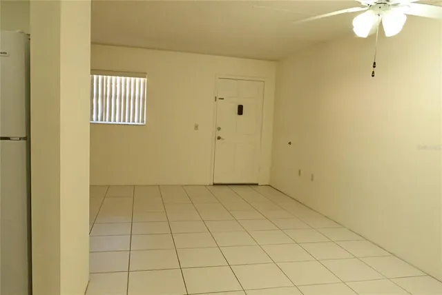 a view of a storage & utility room with a sink