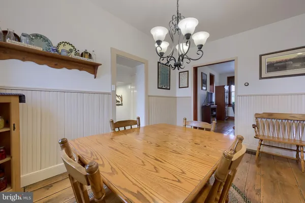 a view of kitchen with furniture and fireplace