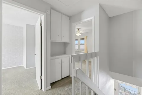 a view of walk in closet with window