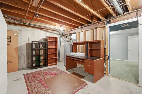 a room with furniture and natural light