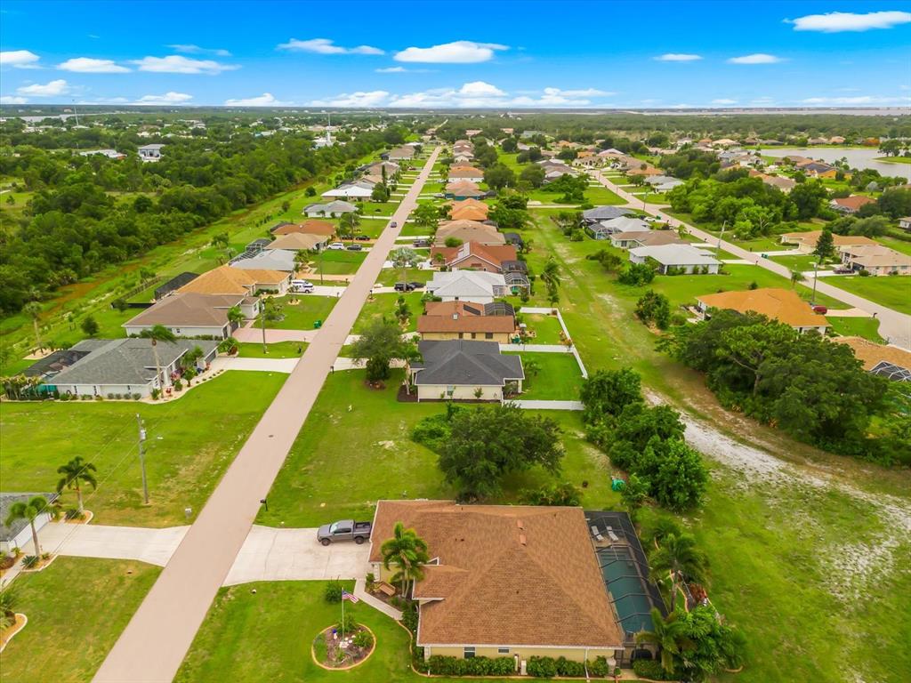 2381 Mauritania Road Punta Gorda, FL 33983 - Photo 6 of 12 an aerial view of residential houses with outdoor space and trees