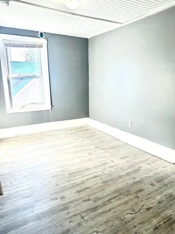 a view of a room that has a window