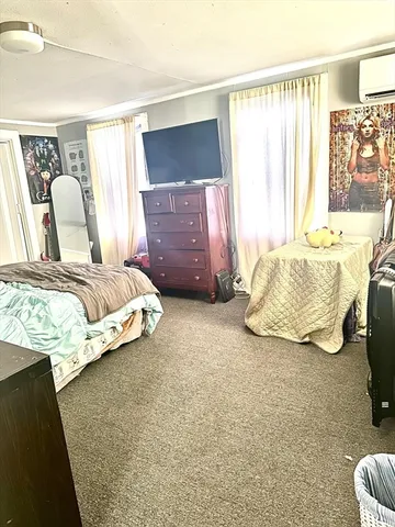 a kitchen with stainless steel appliances a stove a sink and a refrigerator