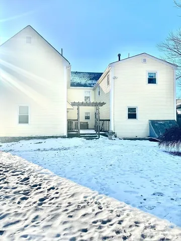 a view of a backyard of the house