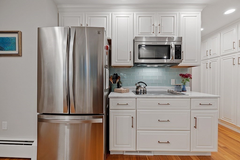 14 Scenna Road Beverly, MA 01915 - Photo 11 of 42 a kitchen with stainless steel appliances white cabinets and a refrigerator