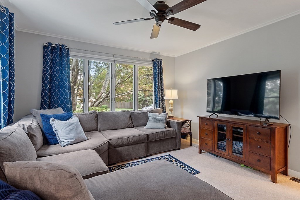 14 Scenna Road Beverly, MA 01915 - Photo 17 of 42 a living room with furniture and a flat screen tv