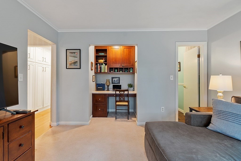 14 Scenna Road Beverly, MA 01915 - Photo 18 of 42 a bedroom with a bed and a flat screen tv