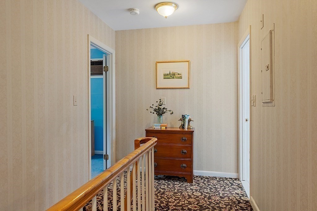 14 Scenna Road Beverly, MA 01915 - Photo 20 of 42 a room with a table and a chair
