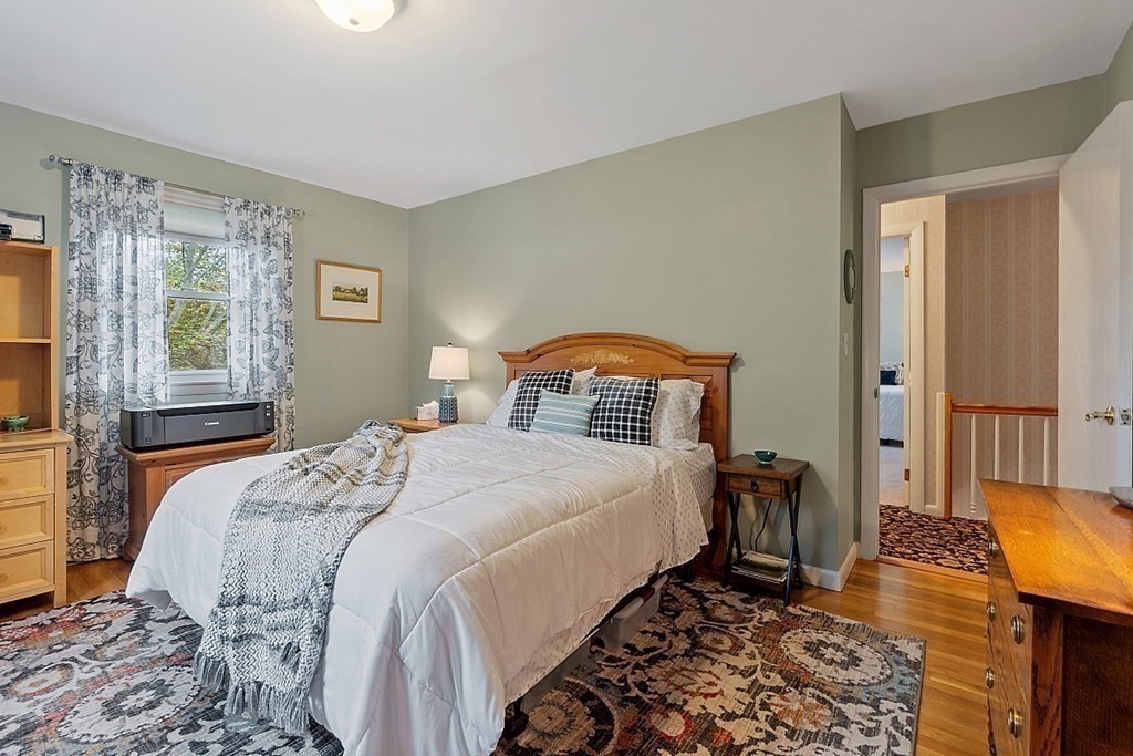 14 Scenna Road Beverly, MA 01915 - Photo 24 of 42 a bedroom with a large bed and a window