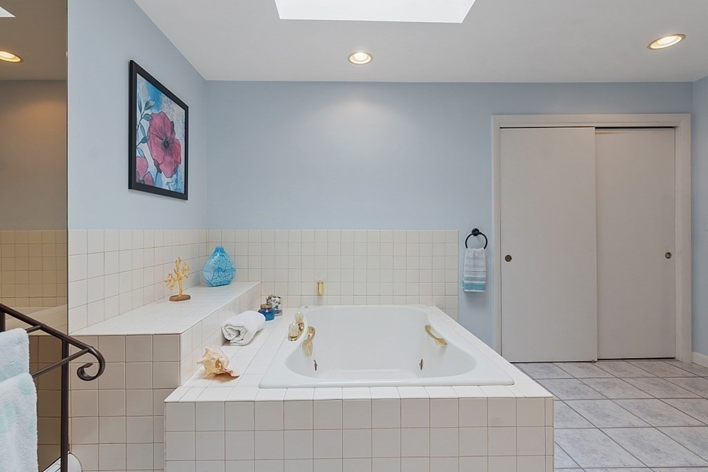 14 Scenna Road Beverly, MA 01915 - Photo 26 of 42 a bathroom with a bathtub and shower