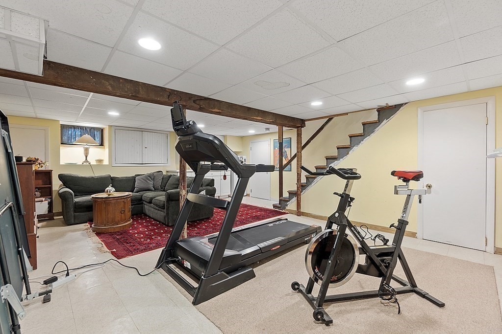 14 Scenna Road Beverly, MA 01915 - Photo 29 of 42 a room with lots of chairs and mirrors