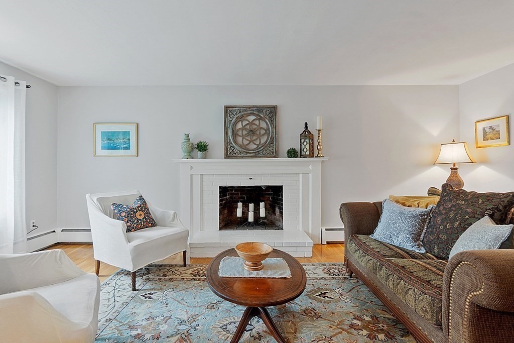 14 Scenna Road Beverly, MA 01915 - Photo 5 of 42 a living room with furniture and a fireplace