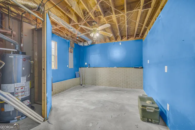 a building outdoor space with patio lots of furniture and plants