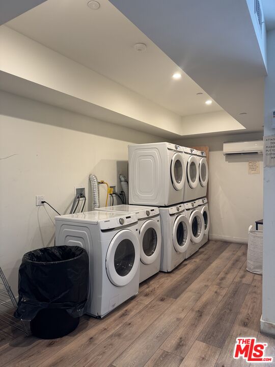 919 South Harvard Boulevard, Unit 403 Los Angeles, CA 90006 - Photo 7 of 9 a utility room with dryer and washer