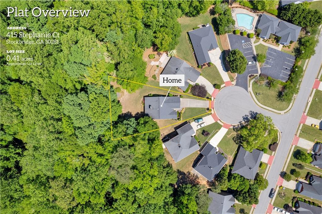415 Stephanie Court Stockbridge, GA 30281 - Photo 1 of 1 an aerial view of a house with a yard and outdoor seating
