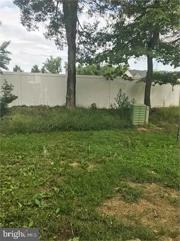 a view of a lake from a yard