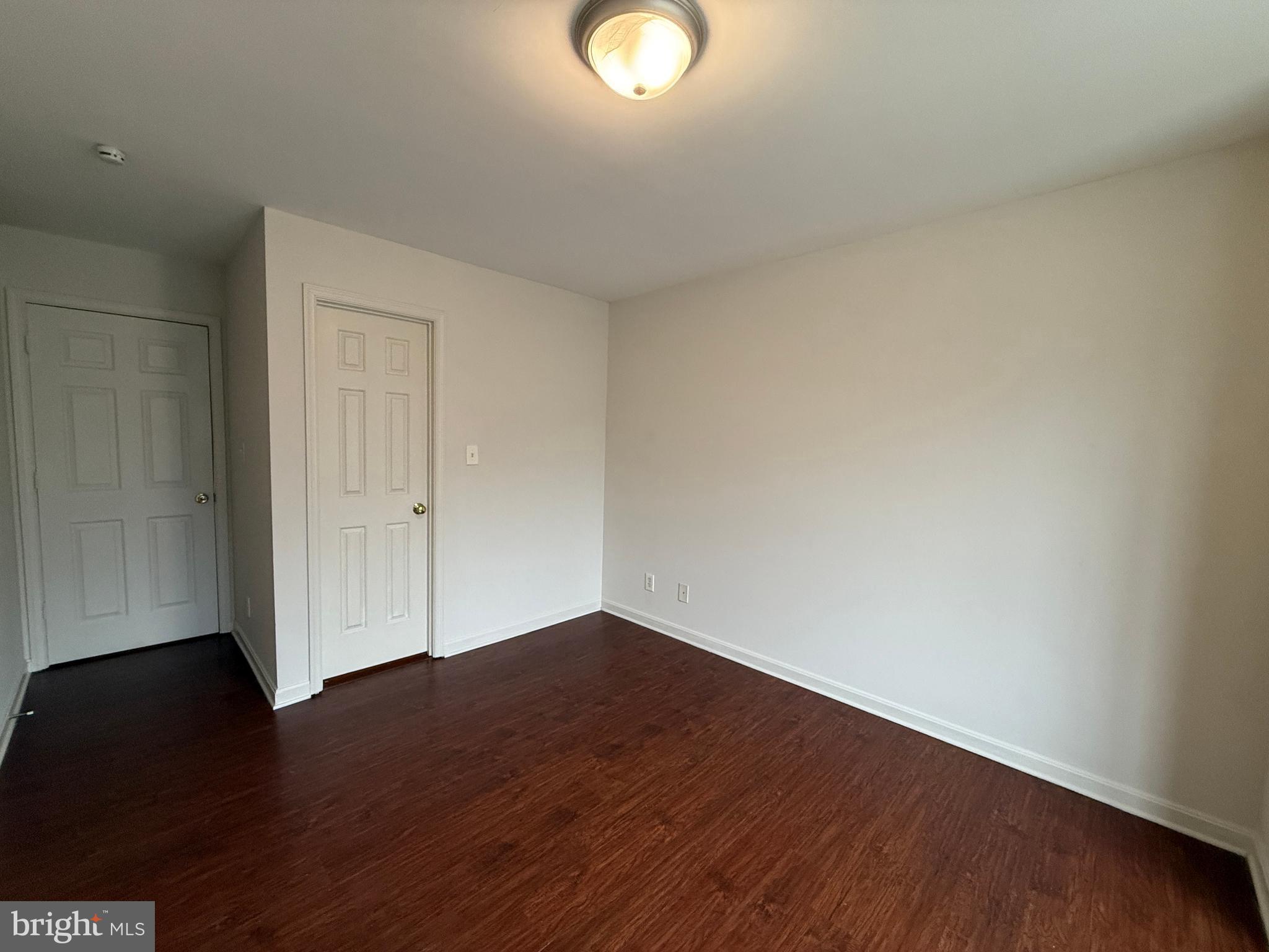4345 Normandy Court Fredericksburg, VA 22408 - Photo 33 of 44 an empty room with wooden floor and windows