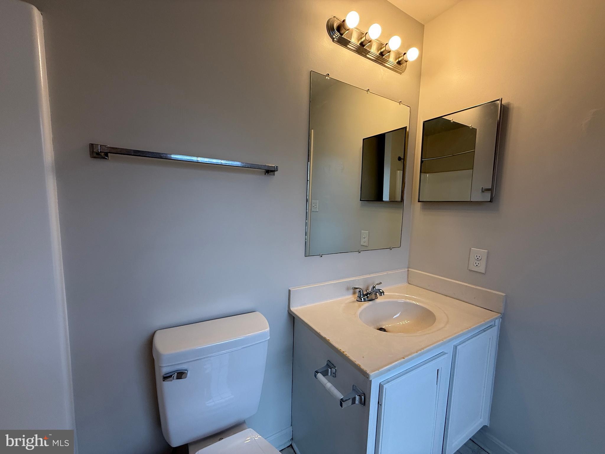 4345 Normandy Court Fredericksburg, VA 22408 - Photo 39 of 44 a bathroom with a sink vanity and mirror