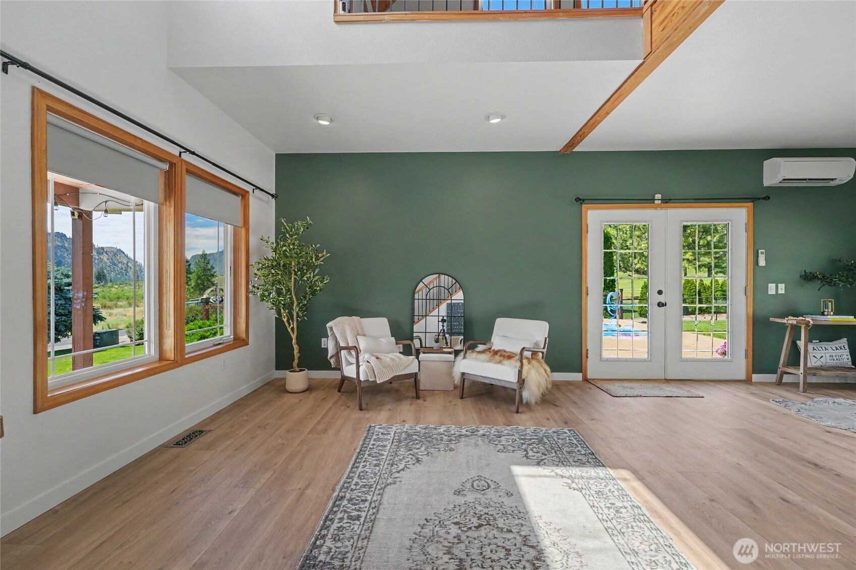 93 Golf Course Drive Pateros, WA 98846 - Photo 12 of 34 a living room with furniture and a large window